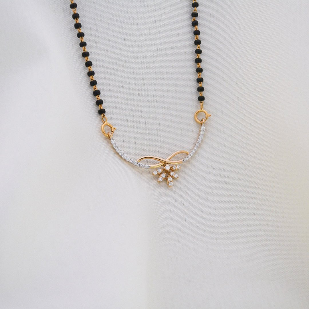 Ekanya 18KT Yellow Gold Diamond Mangalsutra with 0.33 Carat VS GH Certified Diamonds and Floral Pendant - zivar.in