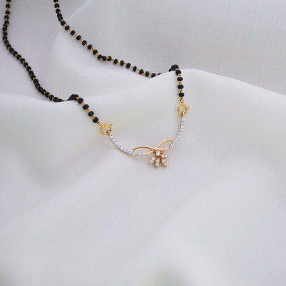 Ekanya 18KT Yellow Gold Diamond Mangalsutra with 0.33 Carat VS GH Certified Diamonds and Floral Pendant - zivar.in
